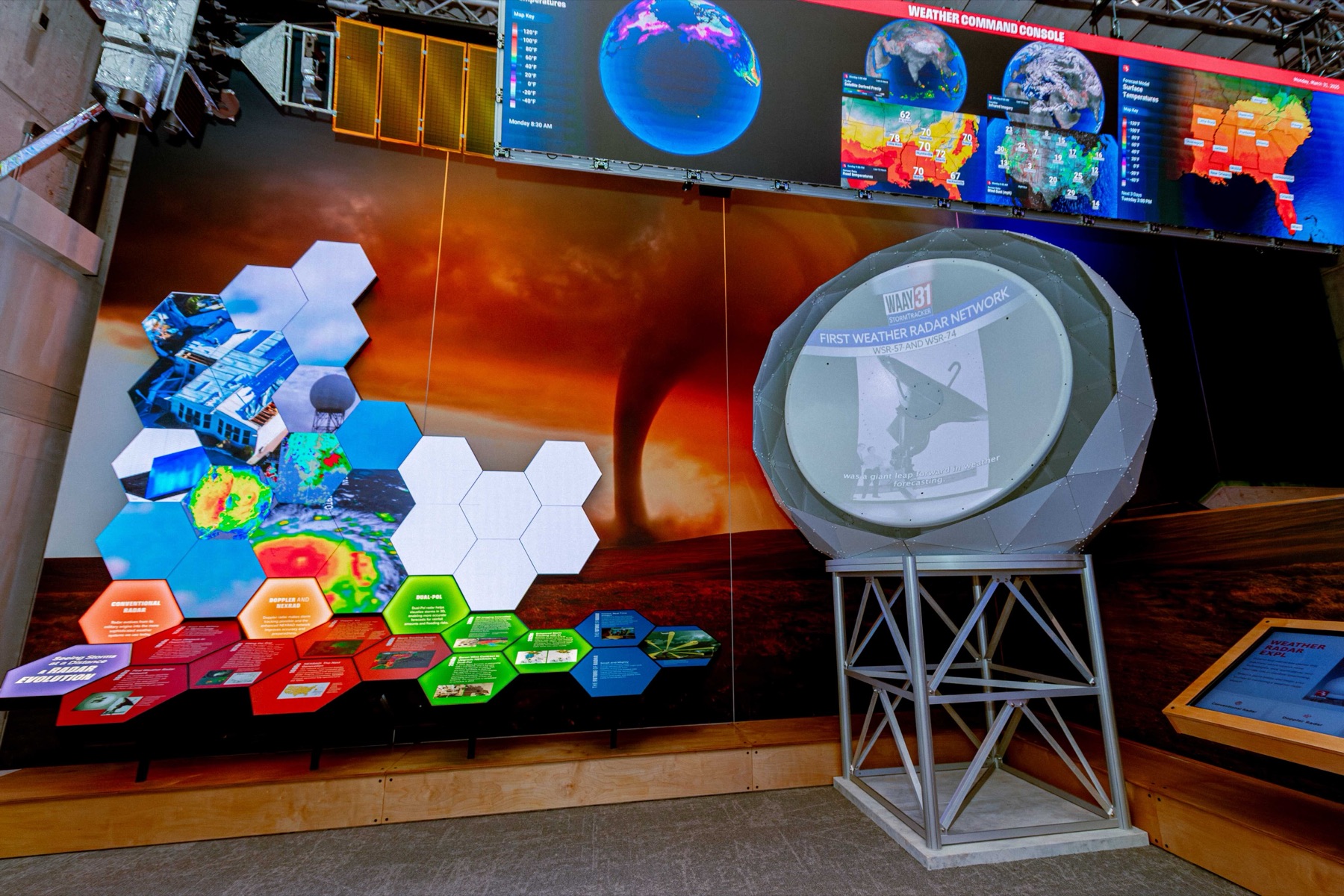 How We Know the Weather exhibit — 24'×14' LED wall with live radar at the U.S. Space & Rocket Center